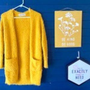 Yellow cardigan